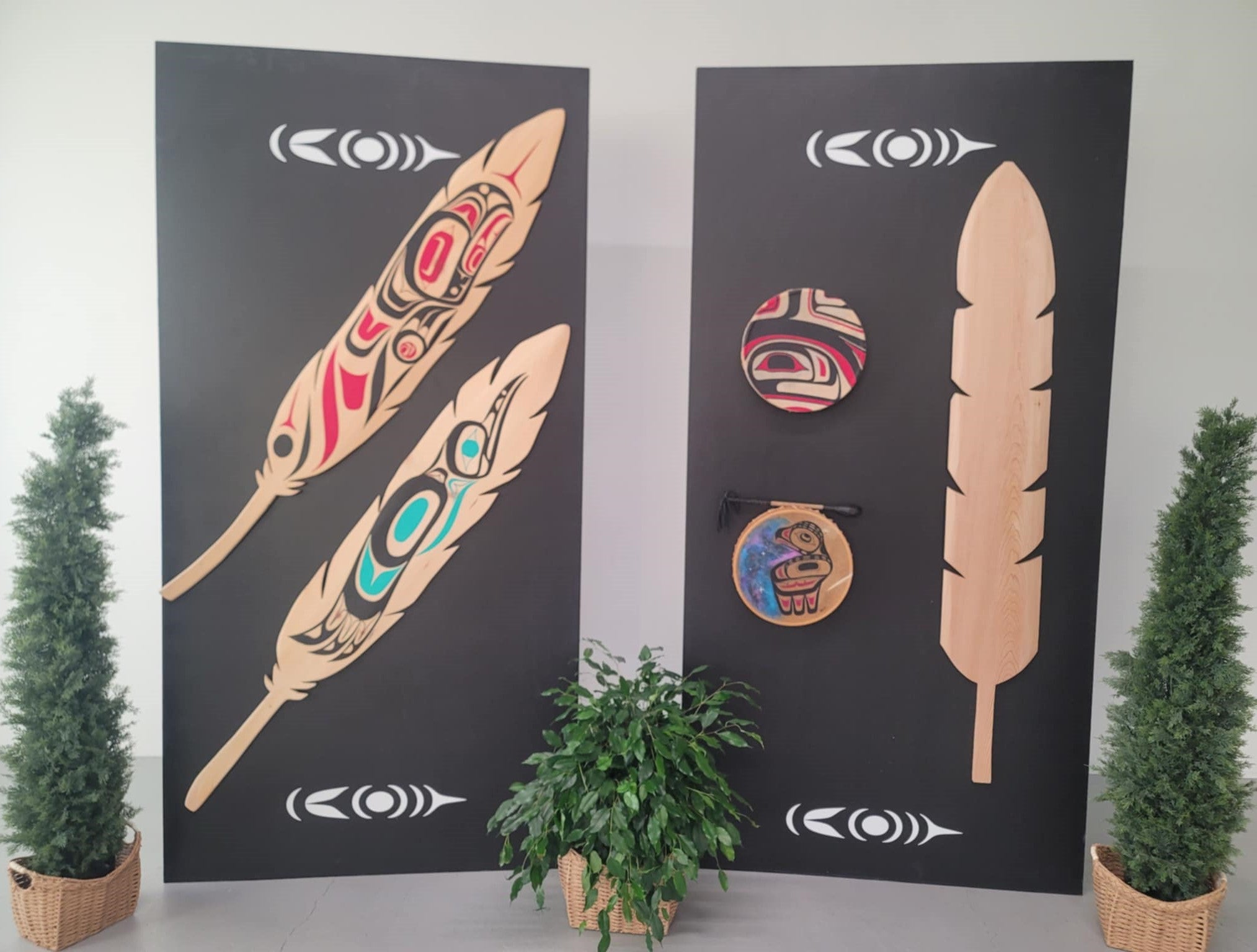 Display panels with wooden feathers and drums