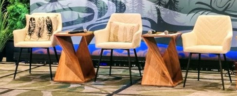 Cream chairs with wooden side tables